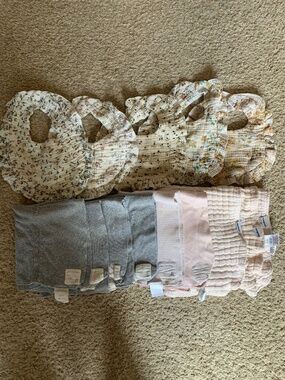 Lot of baby girl bibs and burp cloths